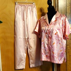 Nicole Stevens satin pajamas are in pastel colors pink/lilac/orange/white.Small.